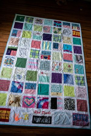 Patchwork memory quilt with a French window pane style.