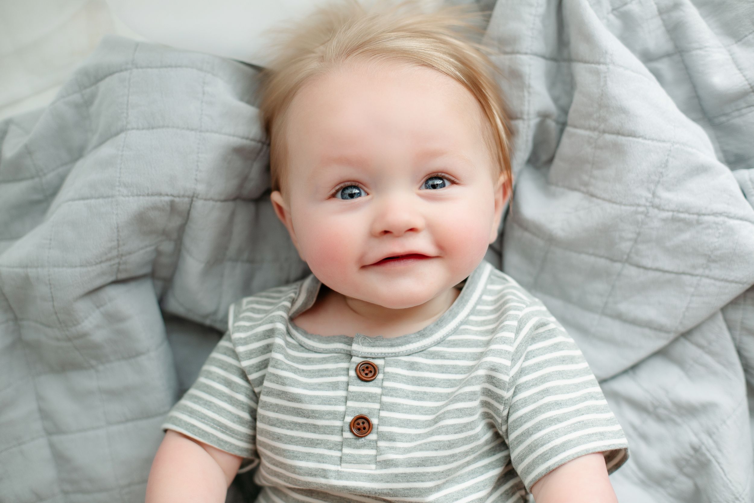 Milestone session with a 6-month-old boy smiling. Greenville, SC newborn photographer, Easley, SC Newborn photographer