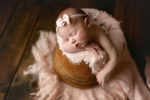 A newborn baby girl in a bucket. Greenville, SC newborn photographer, Easley, SC Newborn photographer