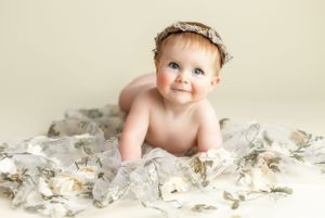 A 6 month old on her belly looking up. Greenville, SC newborn photographer, Easley, SC Newborn photographer