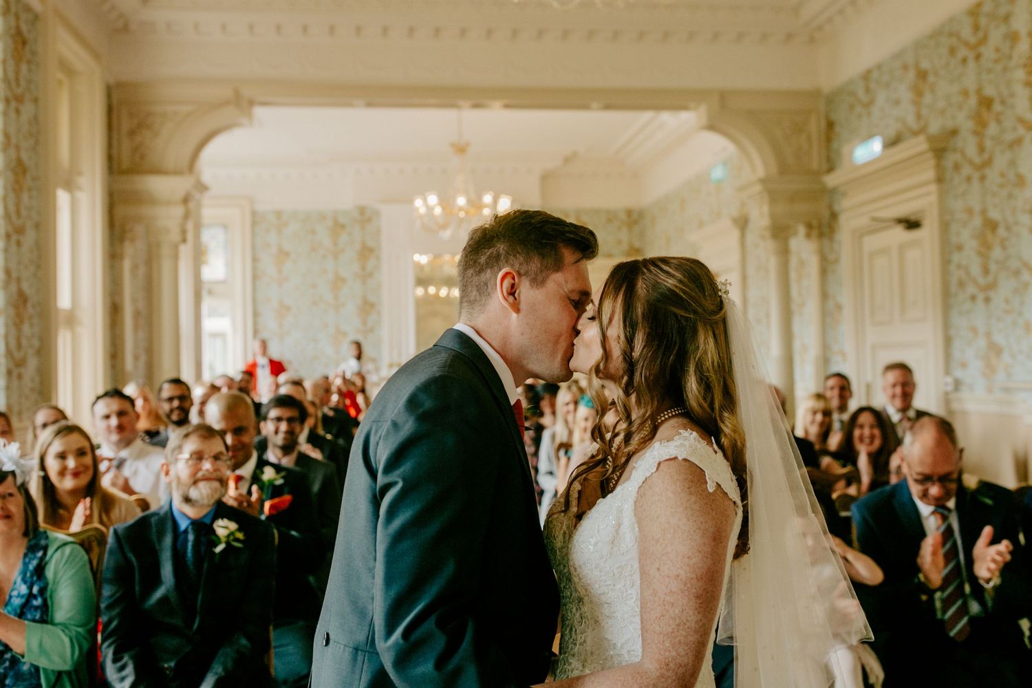 Bride and Groom first kiss at Pendley Manor Hotel, Hertfordshire