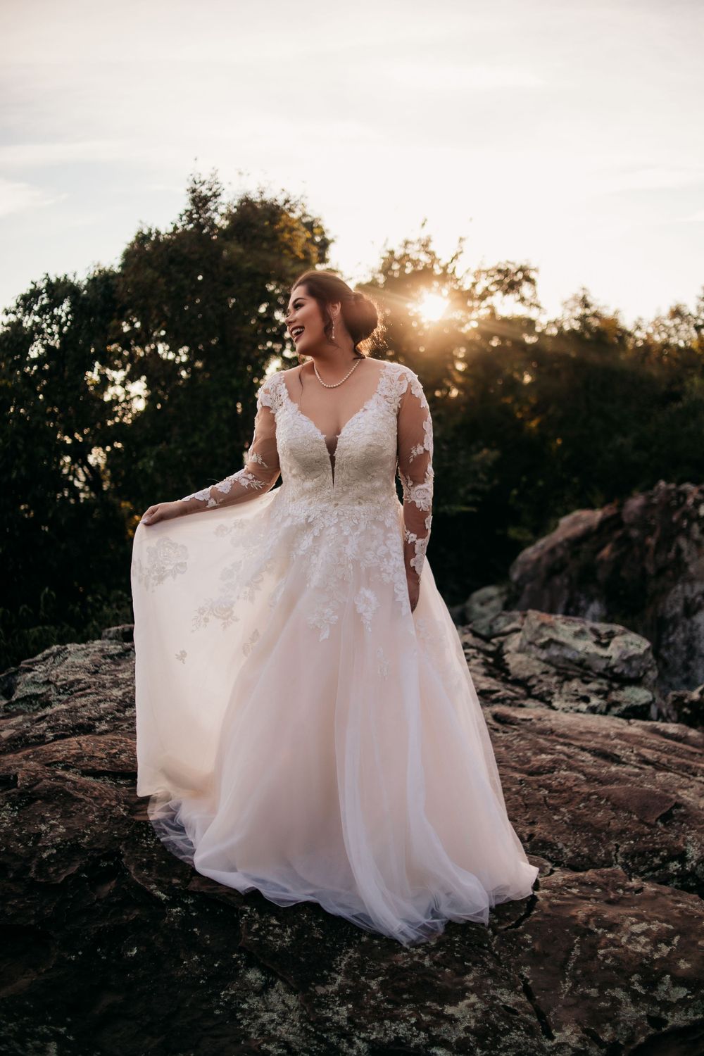 bride holding dress