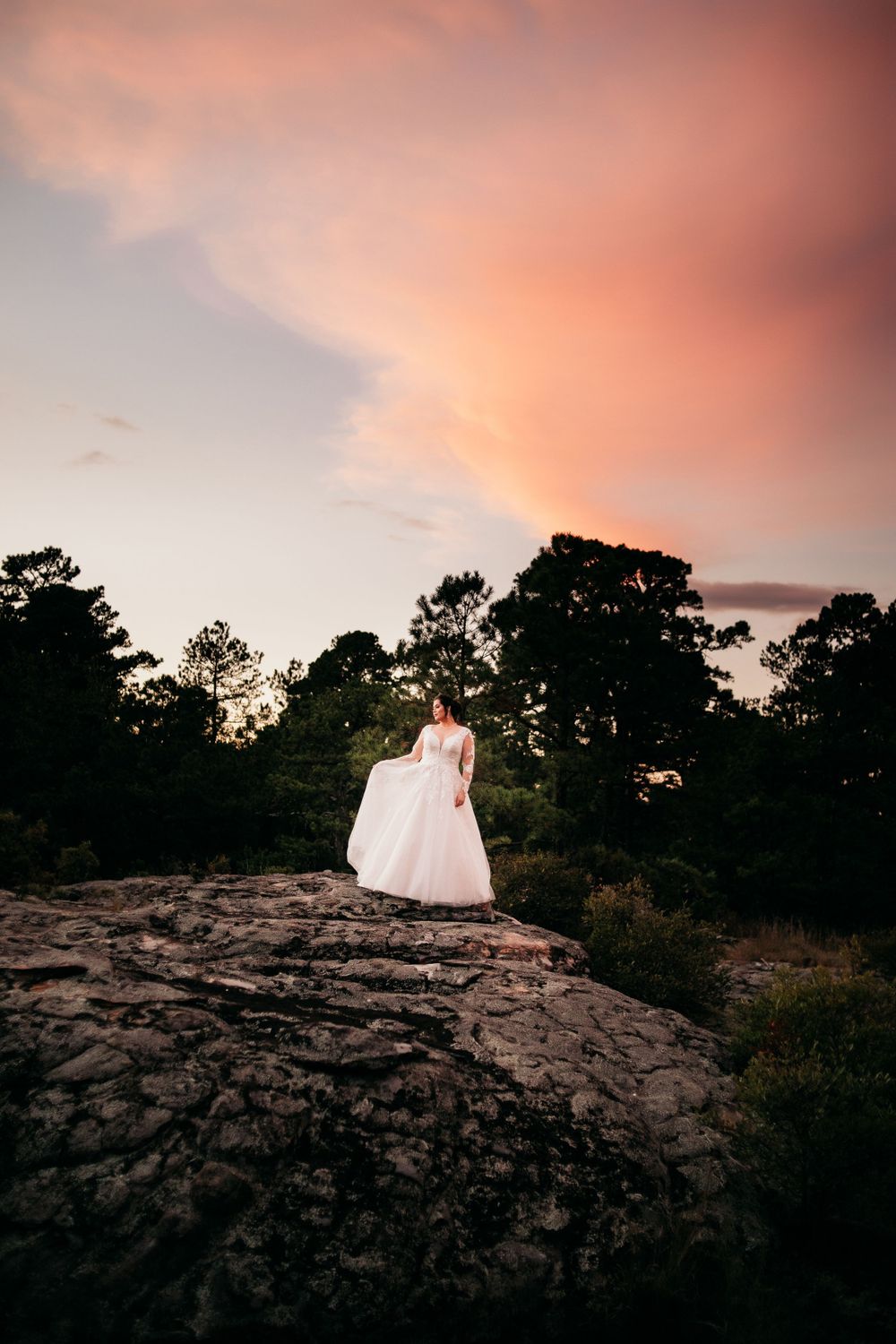 long shot of bride on mountain