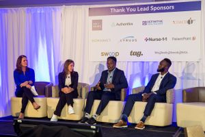 Panel discussion featuring four speakers seated on cream chairs at a sponsored healthcare conference.