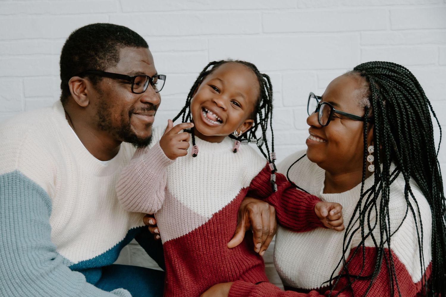 Playful lifestyle photography session showing joyful moments and laughter between friends.