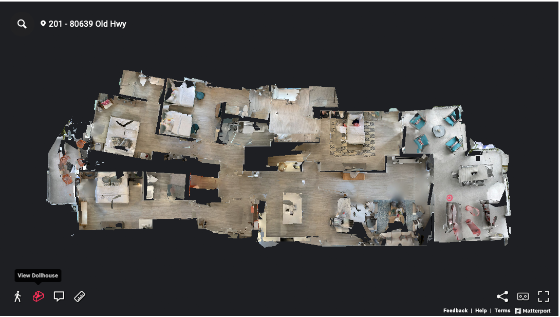 Detailed dollhouse view of multi-room apartment layout with furniture placement.