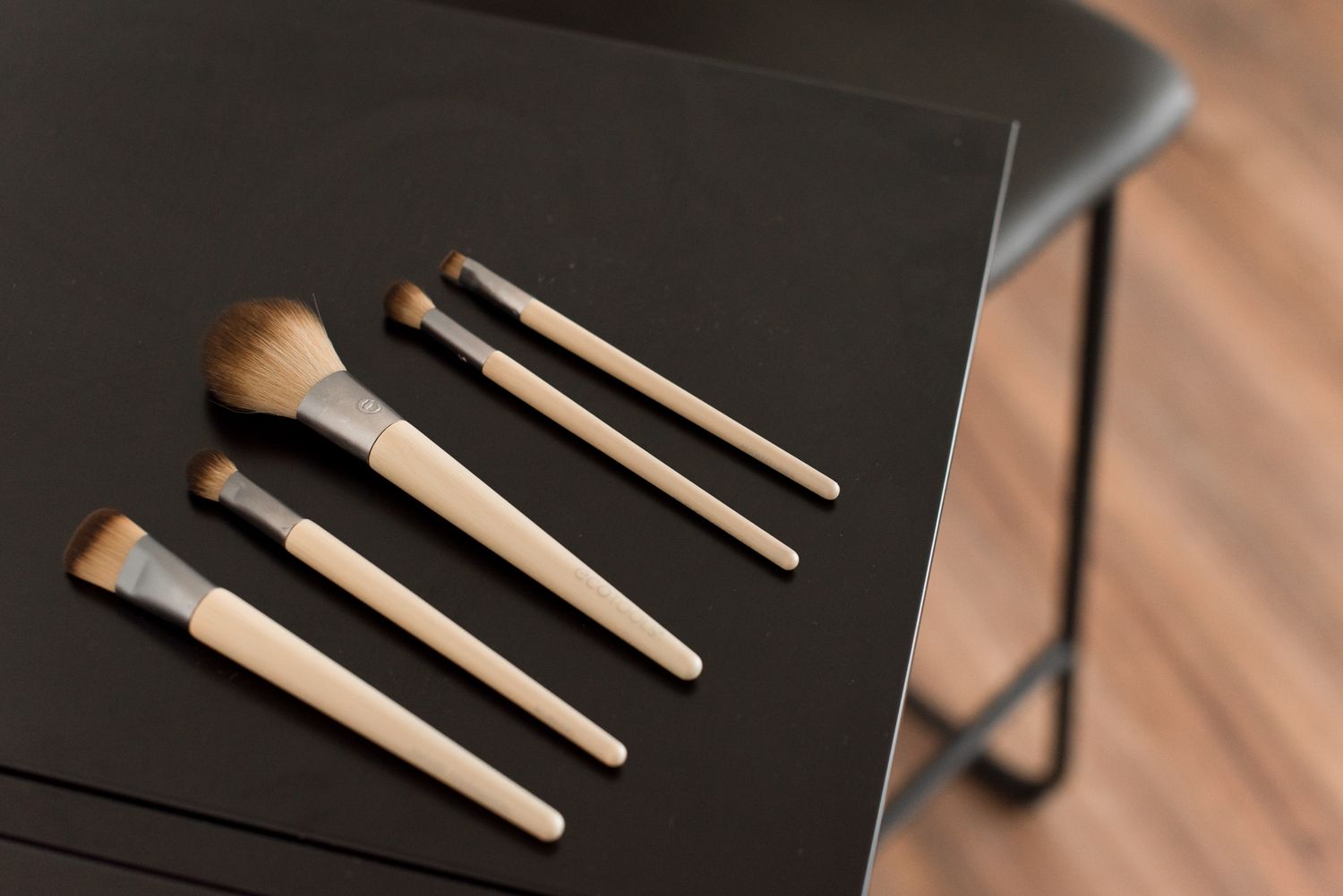 Makeup brushes on mobile black cart