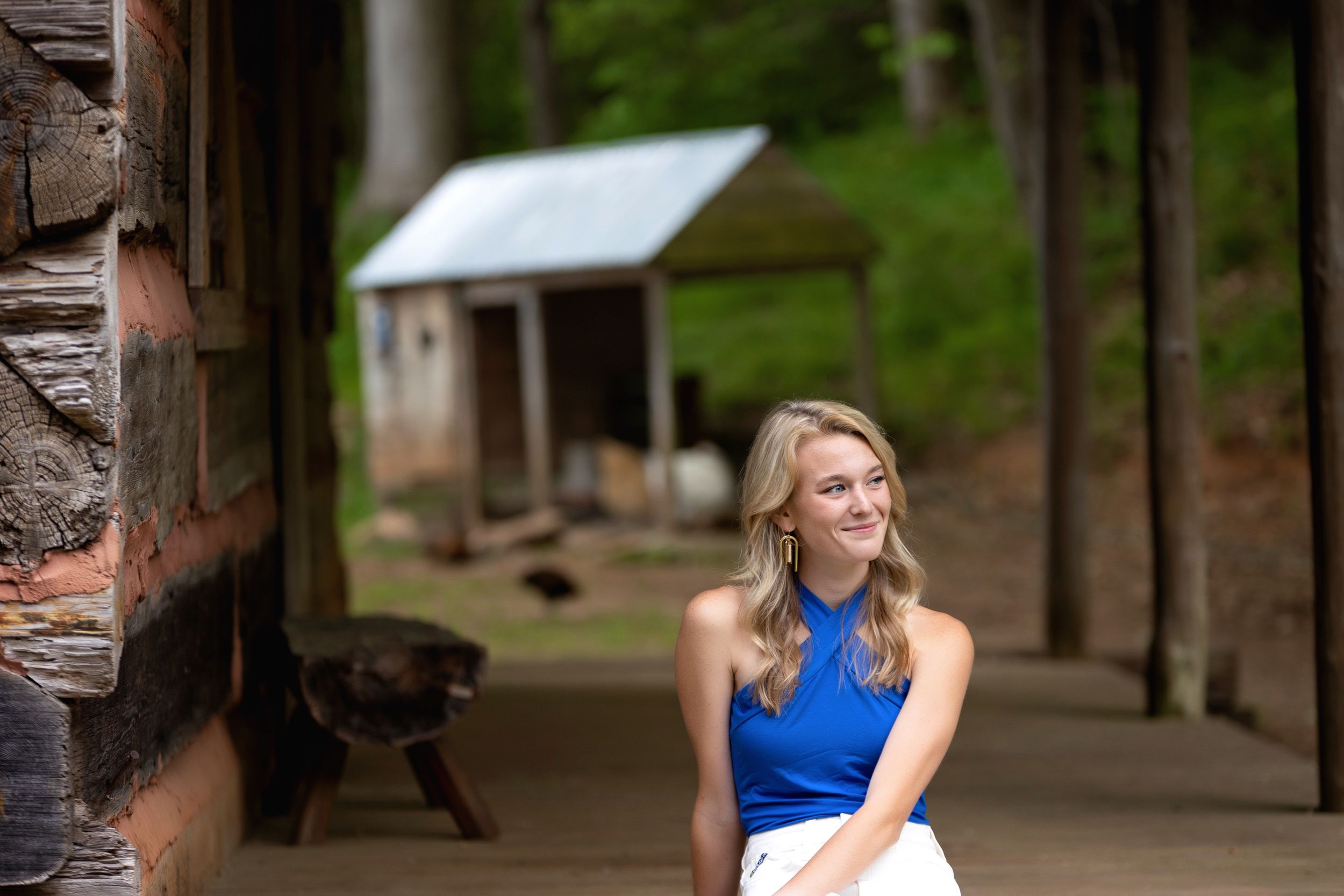 A senior session with a young lady sitting in a cabin. Greenville, SC newborn photographer, Easley, SC Newborn photographer