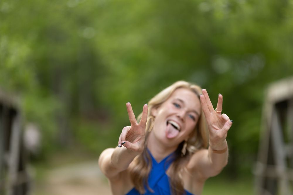 A senior session with a young lady using her fingers for the numbers. Greenville, SC newborn photographer, Easley, SC Newborn photographer