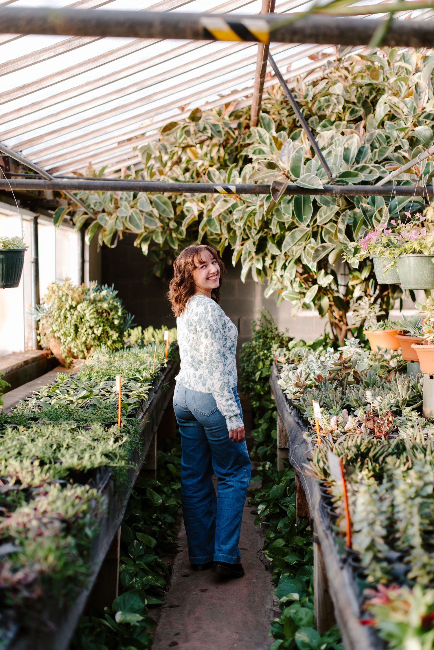 High school senior pictures Plant Kingdom greenhouse Wichita, KS