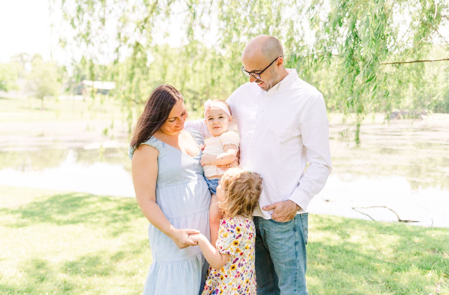 Family looking at each other and smiling during a Hudson Valley, NY family session