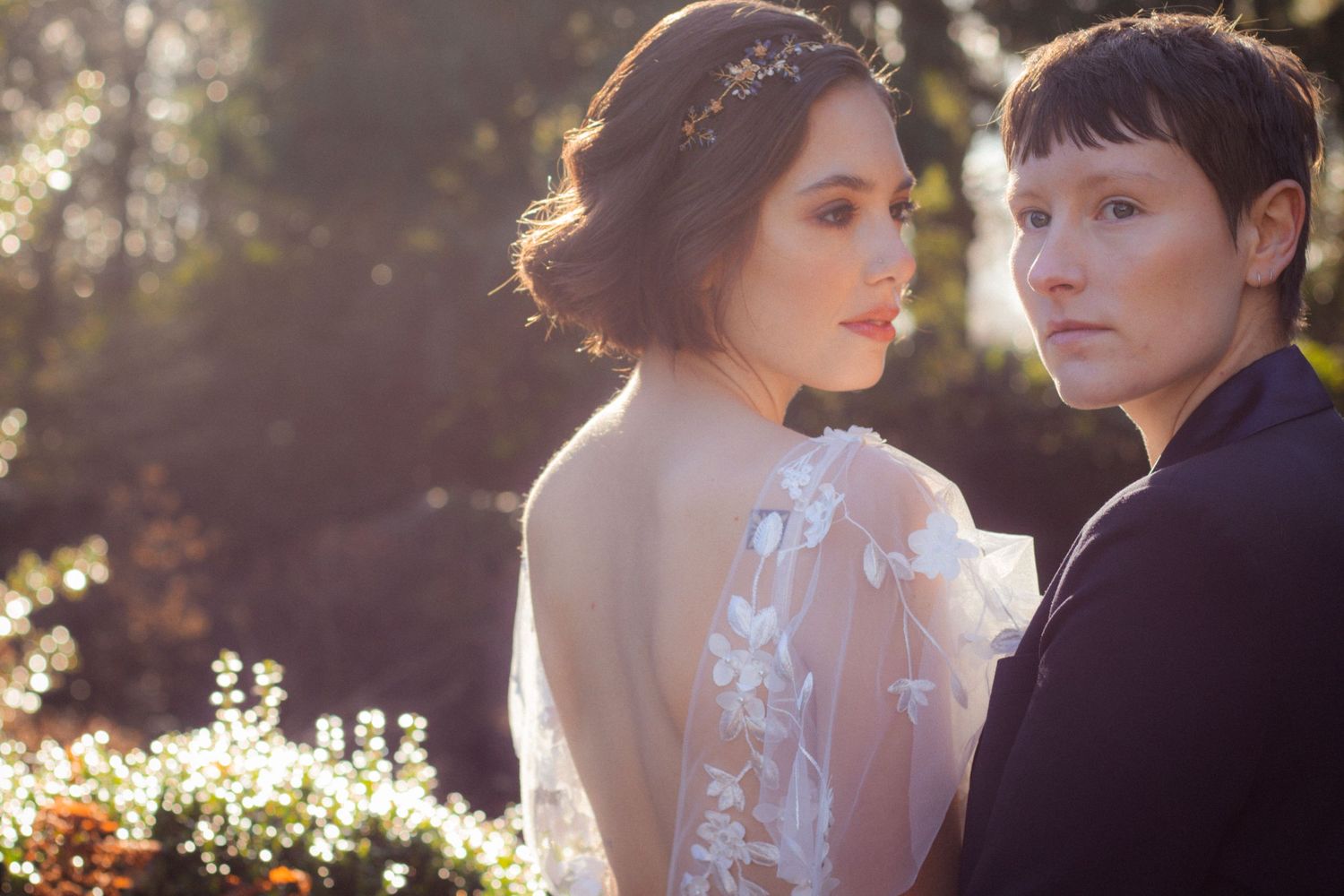 two brides during golden hour at larmer tree gardens by Dominique Lauren Photography