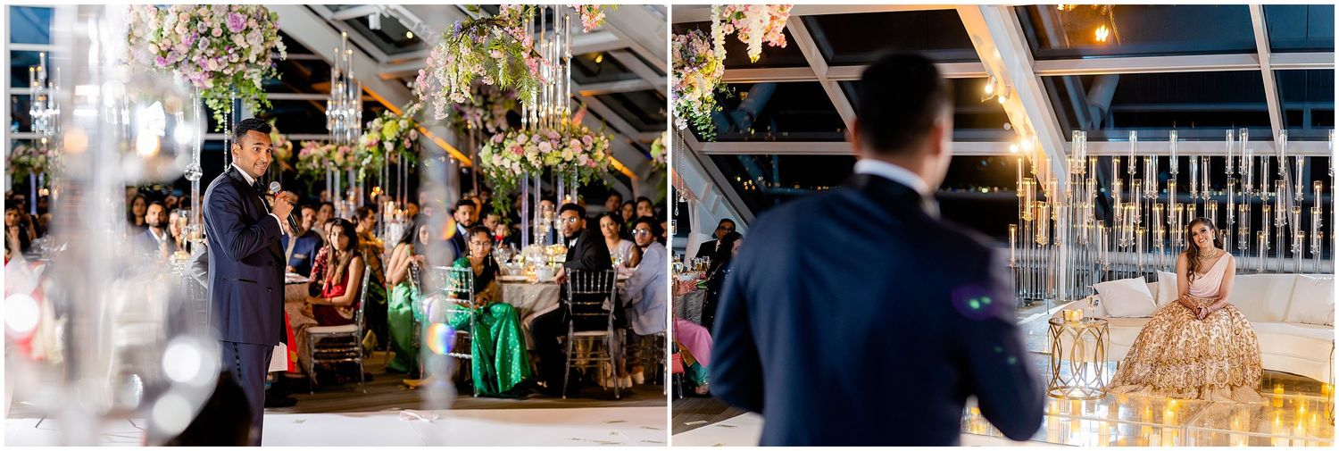 Lively wedding reception with guests dancing under decorative lighting.