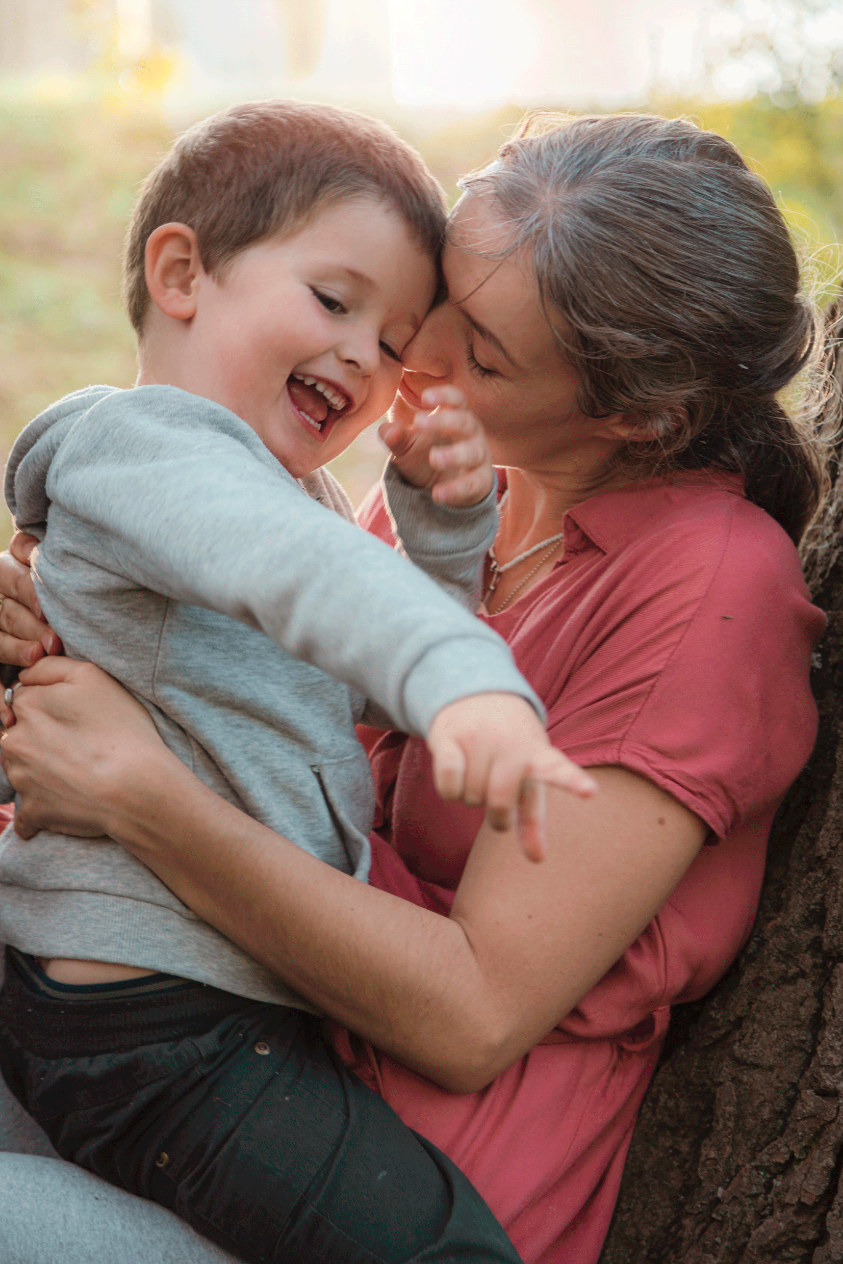 Intimate and loving moment between a young son and his mother