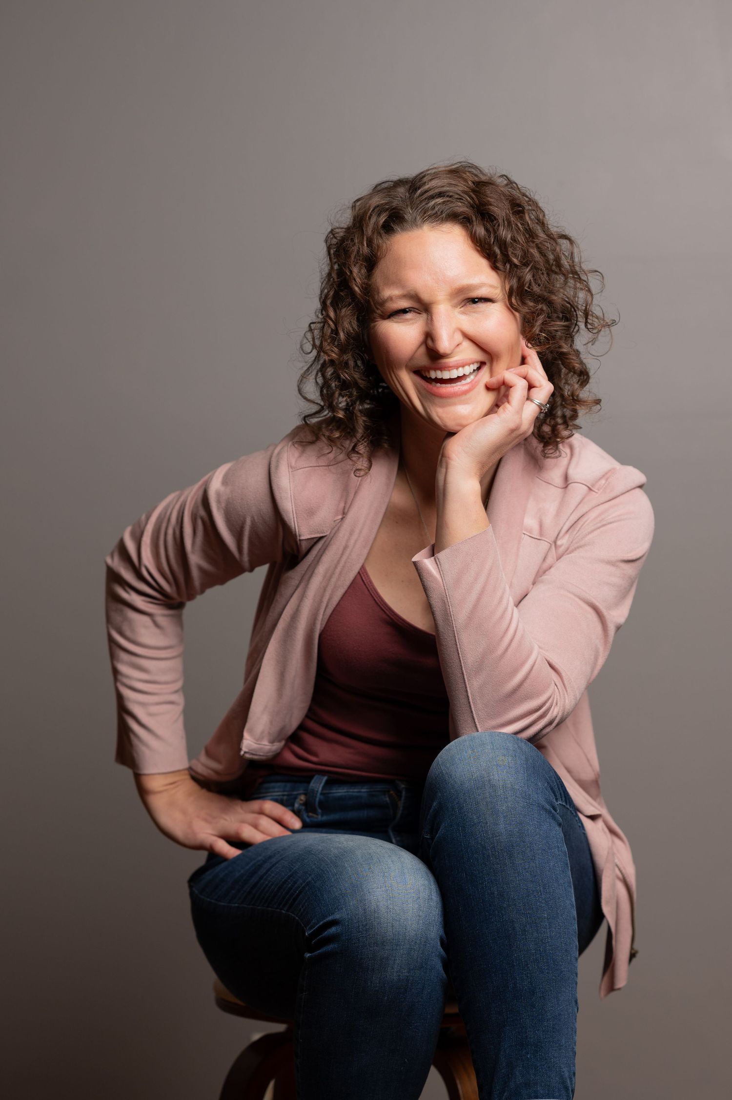Liz Grandy smiling at camera. Elizabeth Grandy Photography, Chelsea based photographer serving central Alabama