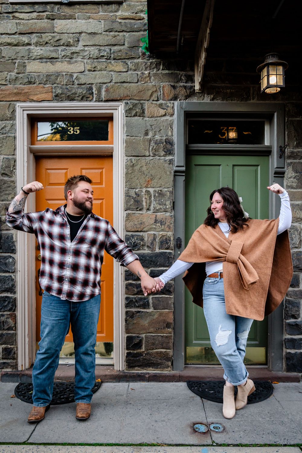 A sequence of dance-like poses shown against a stone building wall with colorful doors in the background.
