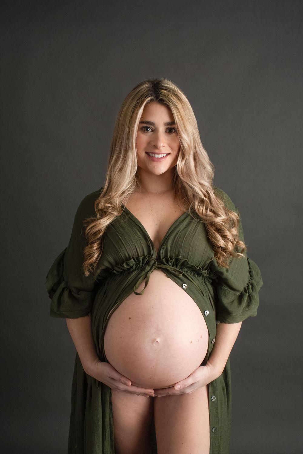 a beautiful pregnant woman during a maternity photography photoshoot in Swansea, MA