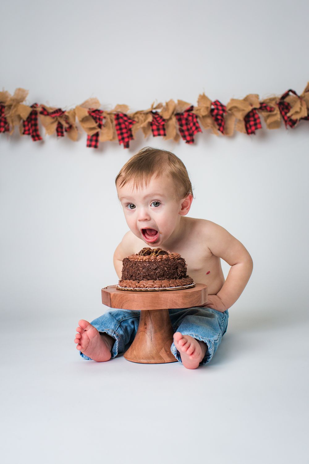 baby newborn being photographed at a newborn photography studio in Swansea, MA