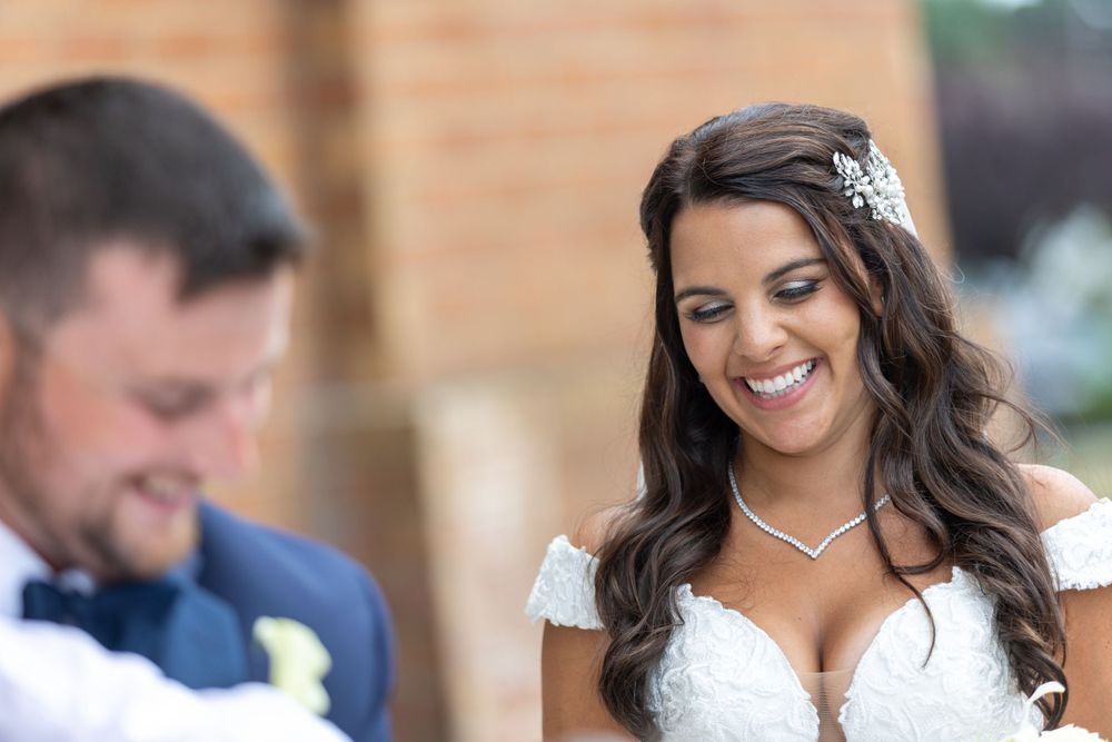 A heartfelt candid moment captured during a wedding celebration.