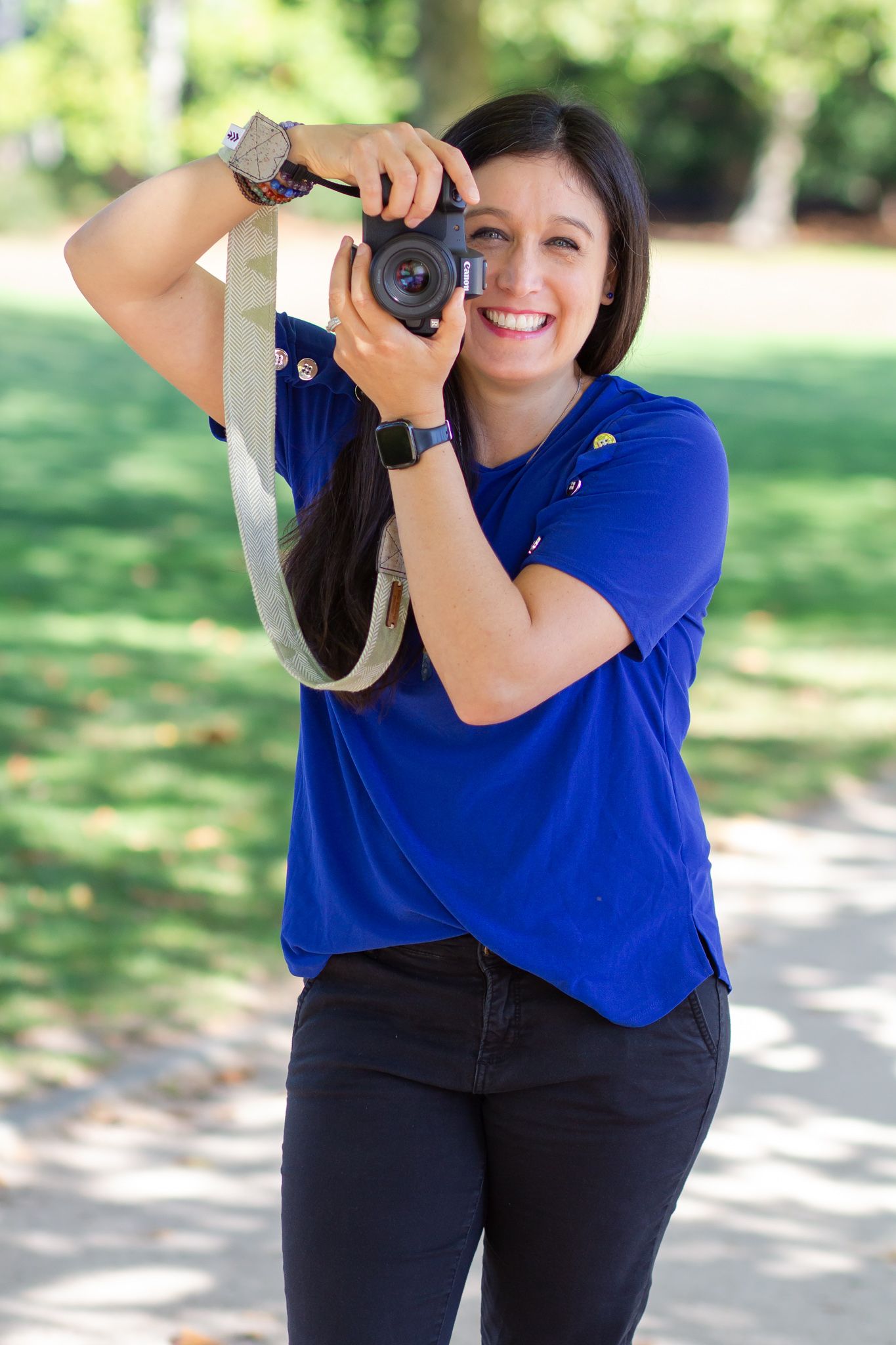 Seattle to Tacoma Washington lifestyle personal branding photographer woman holding camera laughing