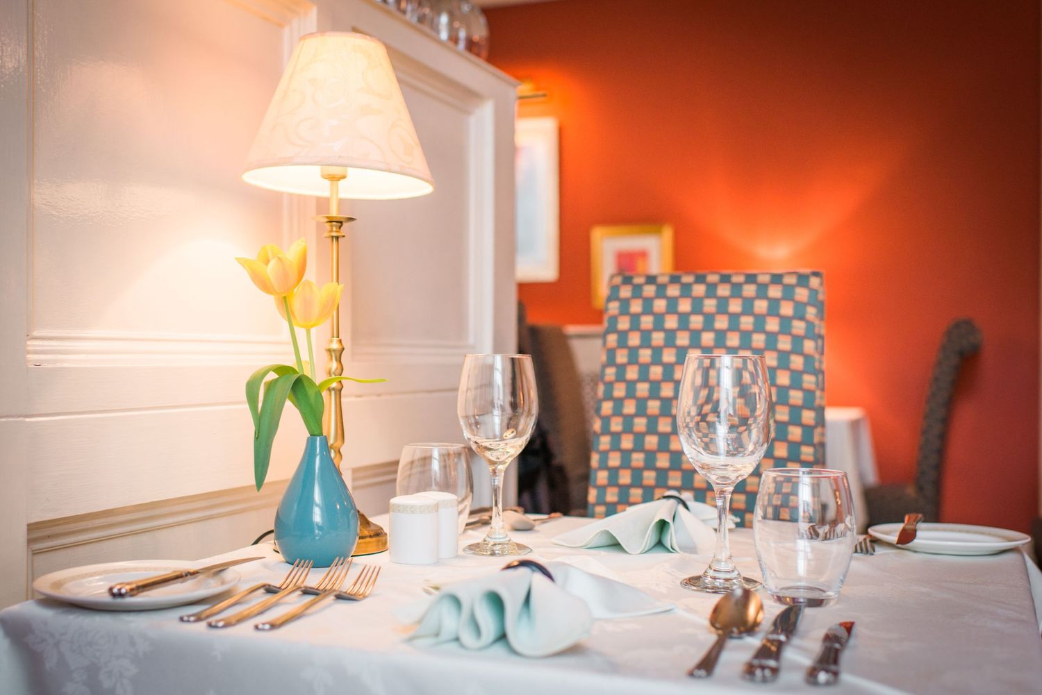 Commercial image of a table in a restauraunt with soft lighting