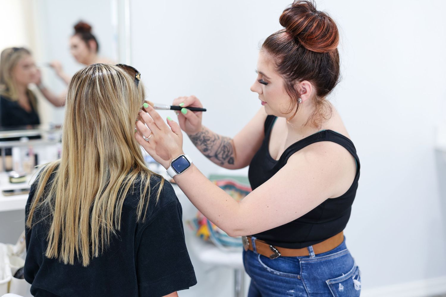 Mikaela Elise doing hair and makeup for our session at the Anchora Event Center in Mansfield, TX