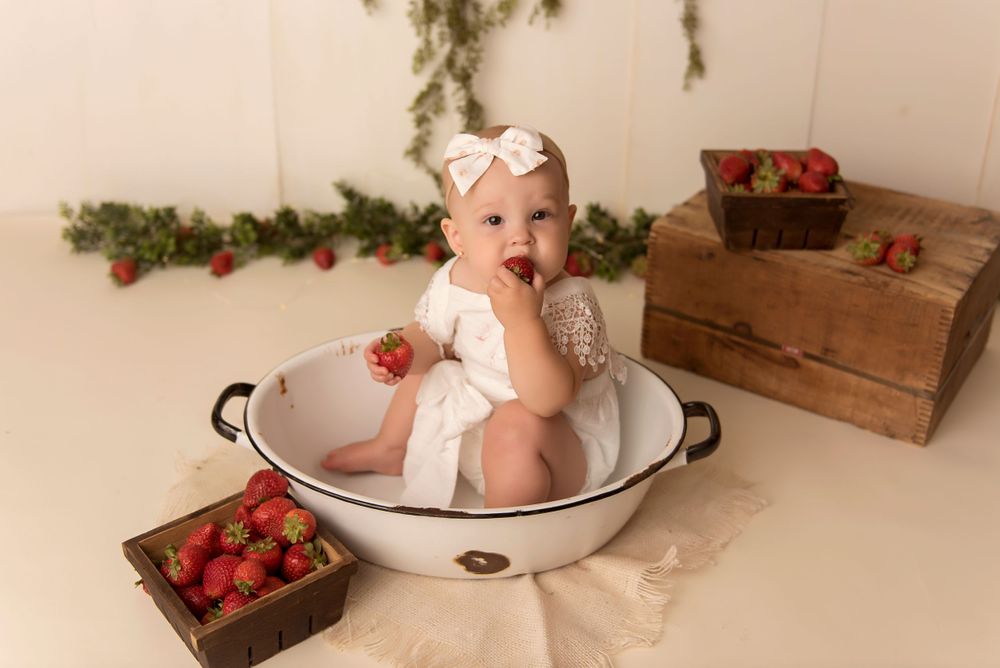 baby girl eating strawberries, Vermont family photography