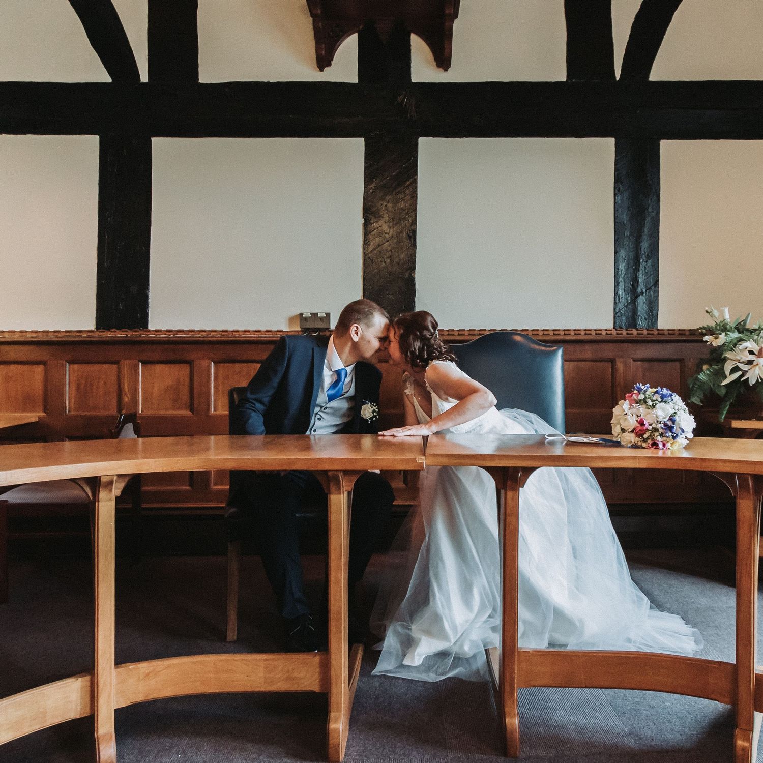 Bride and Groom resting foreheads in their wedding ceremony