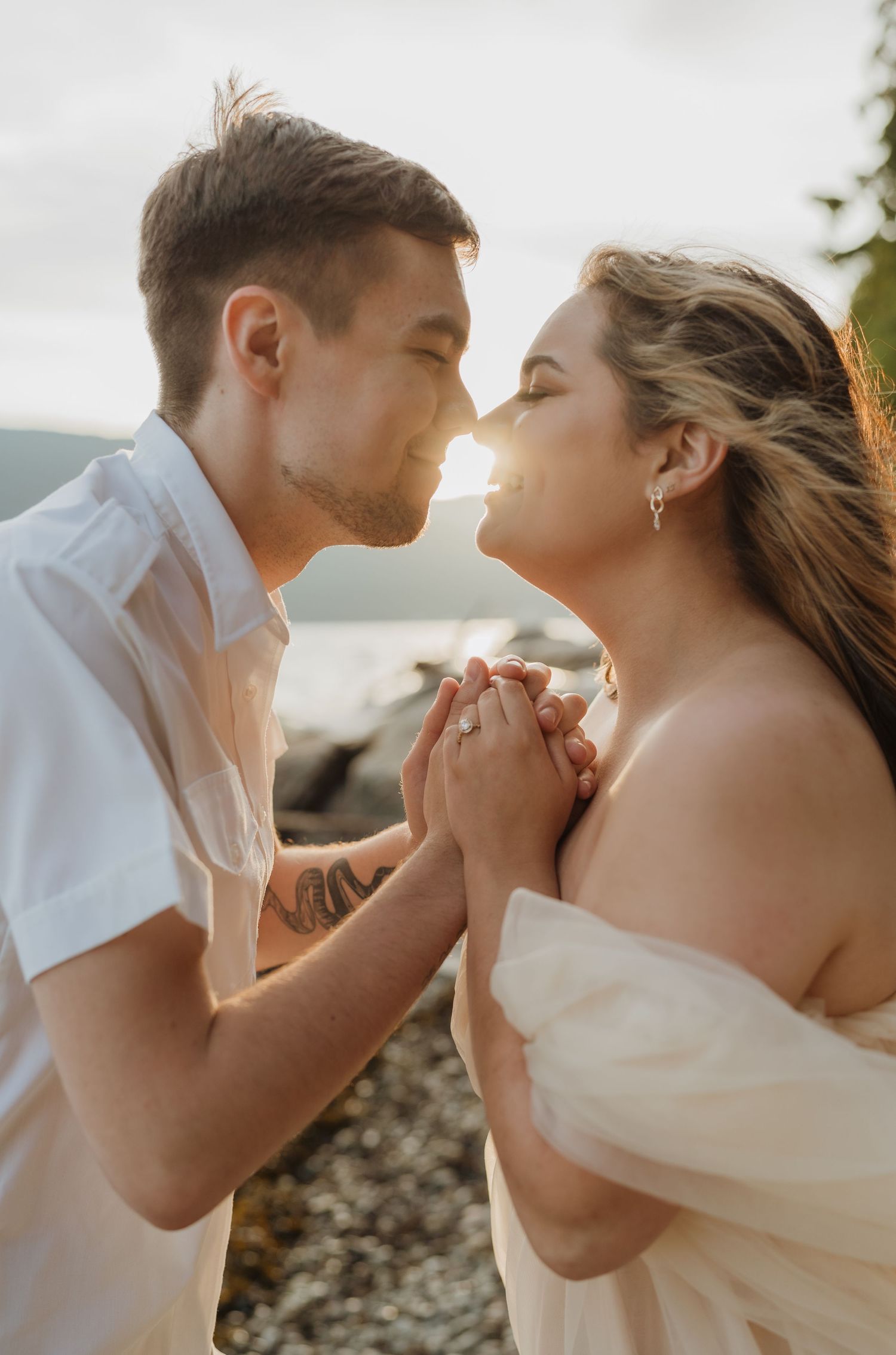 sunset-engagement-couple-about-to-kiss