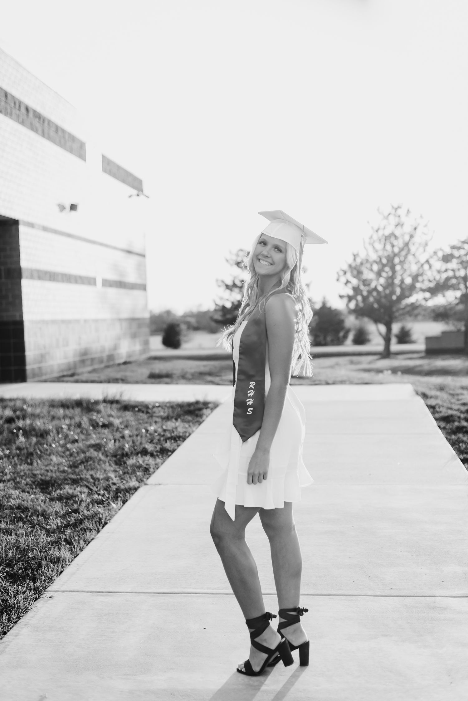 High school senior pictures with cap and gown at Rose Hill in Wichita KS Kansas