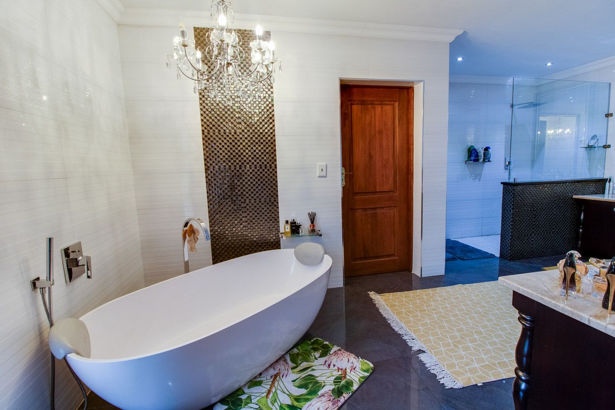 Luxurious bathroom with chandelier.