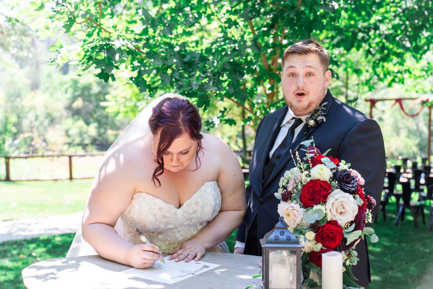 bride signs the certificate