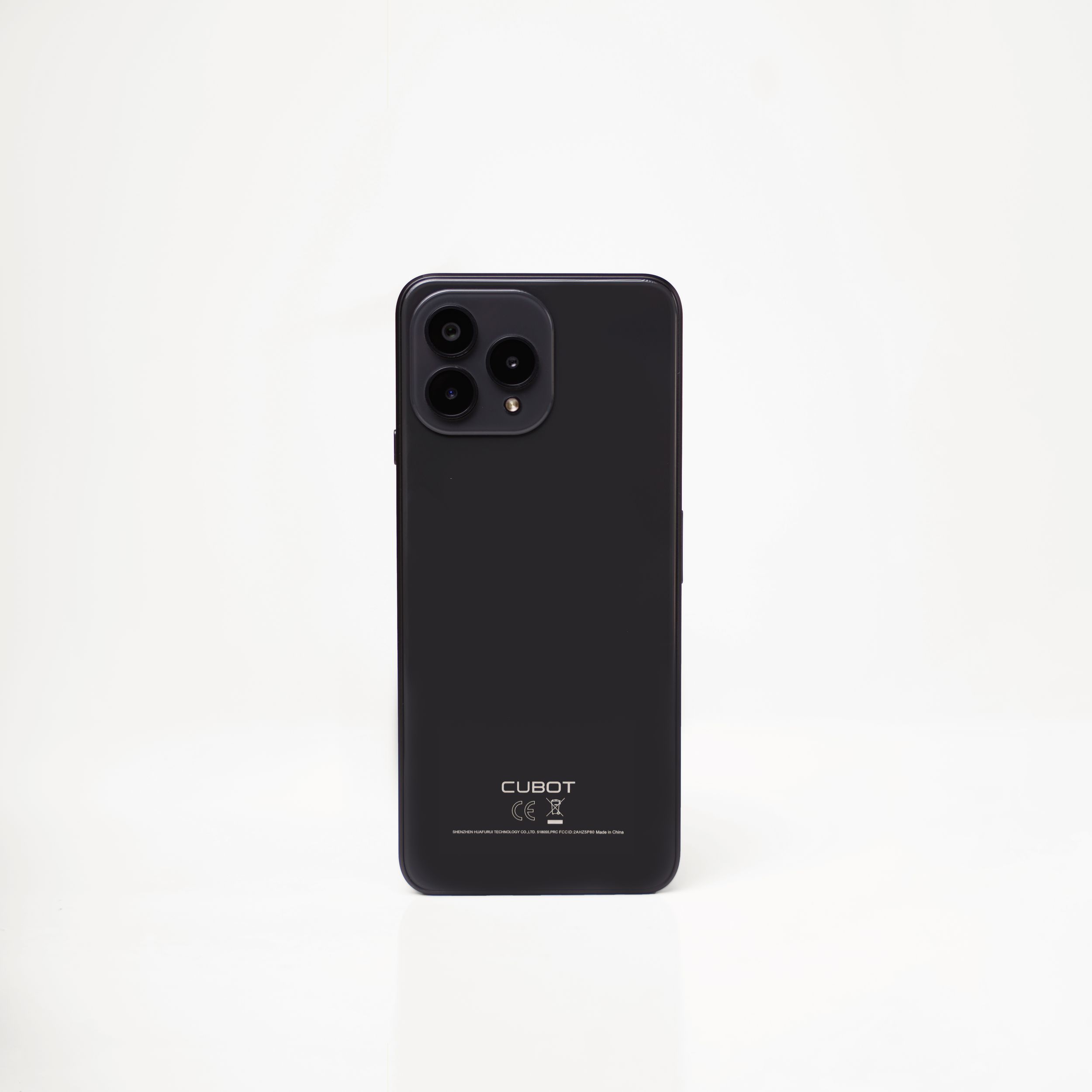 Black smartphone with triple camera system shown from rear view on white background.