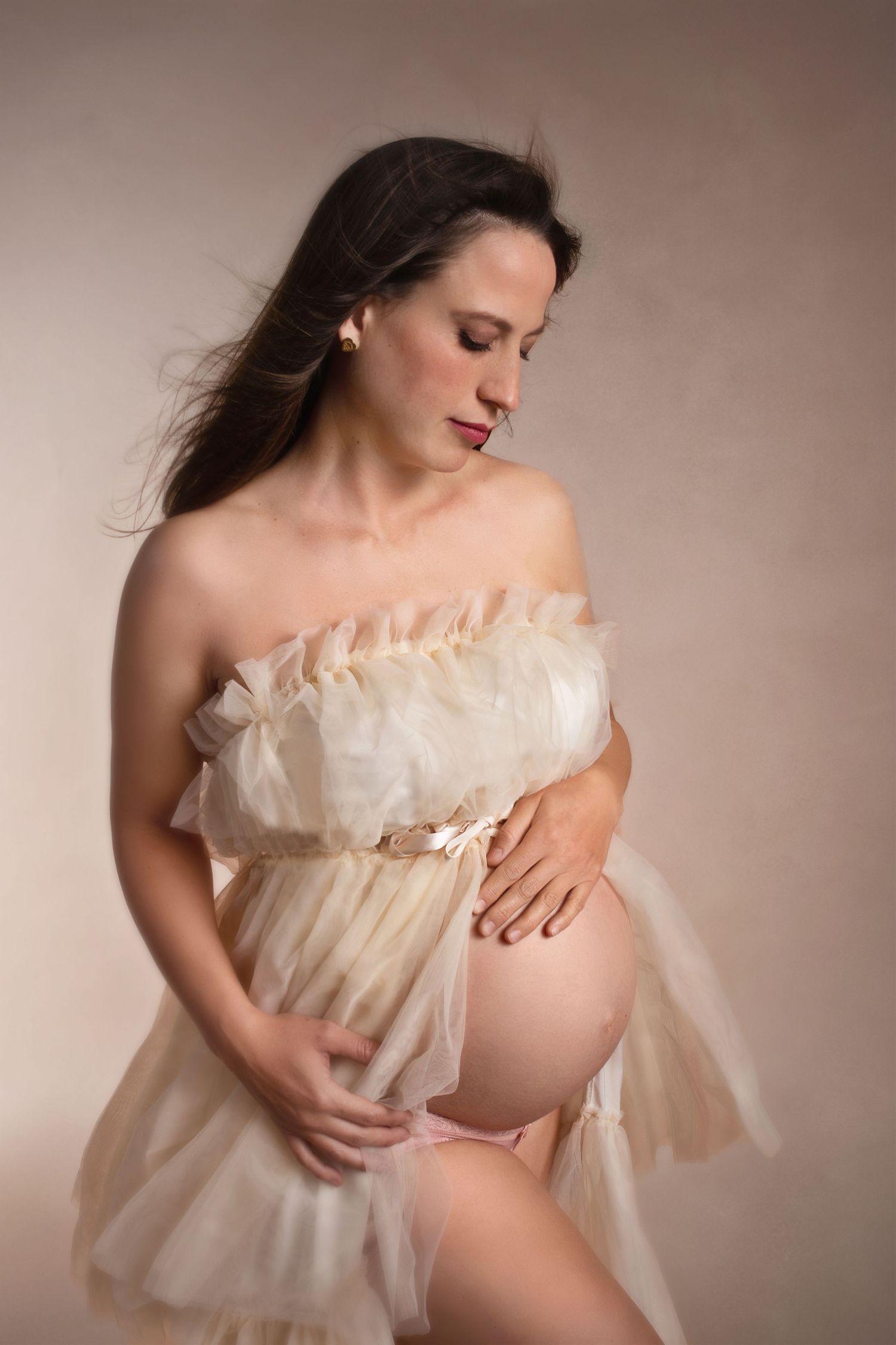 Retrato maternidad en estudio