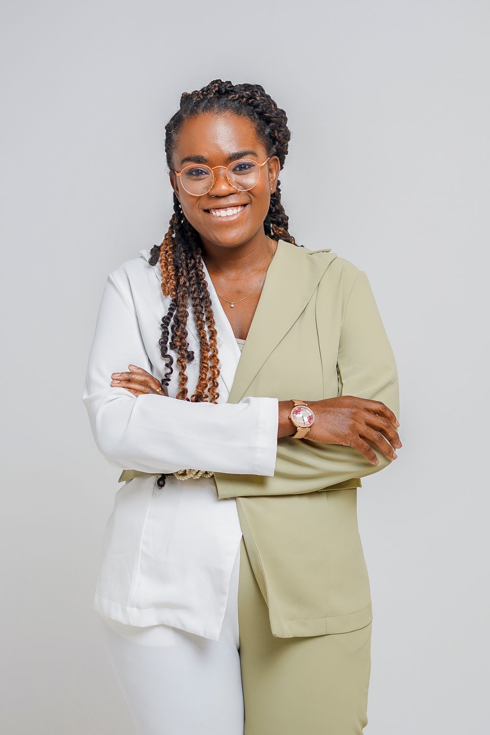 Professional portrait series showing two people in business attire posing together against a grey background.