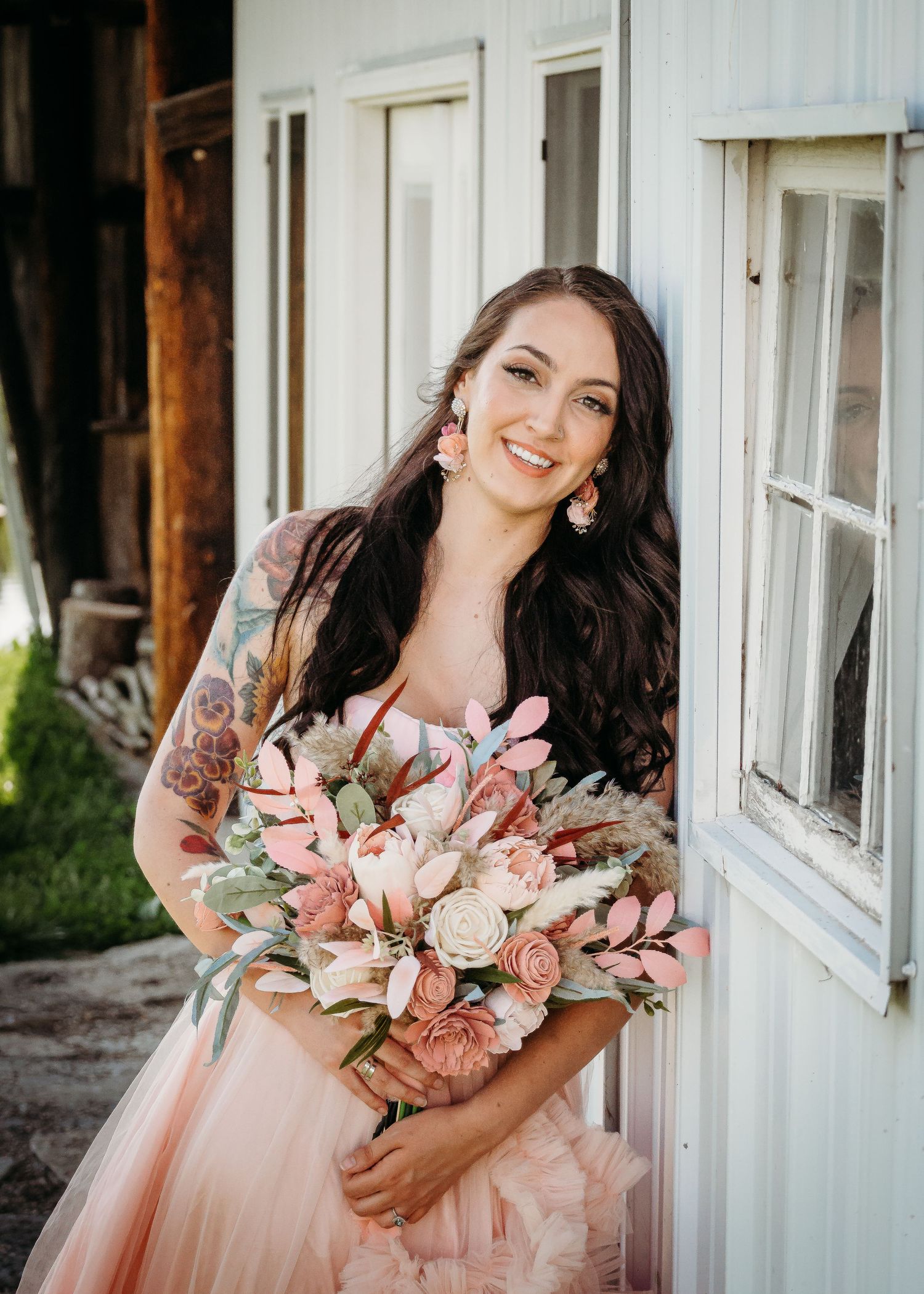 unique bride chose a pink gown