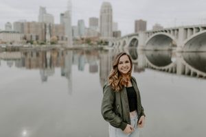 City skyline and bridge view with moody overcast atmosphere.