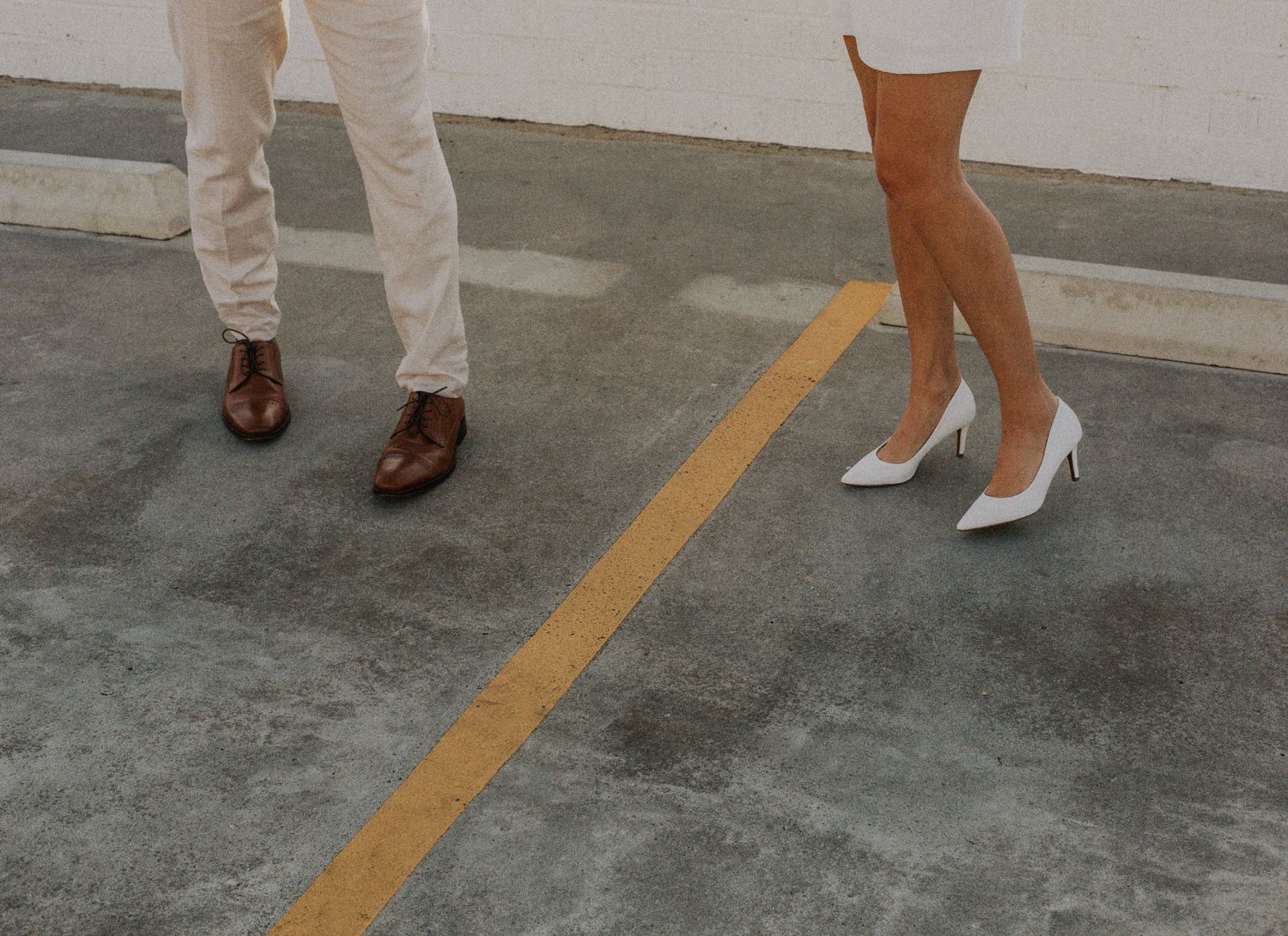 35mm film photo of fun bridal themed engagement shoot on roof of parking structure in Lido Marina, Newport beach