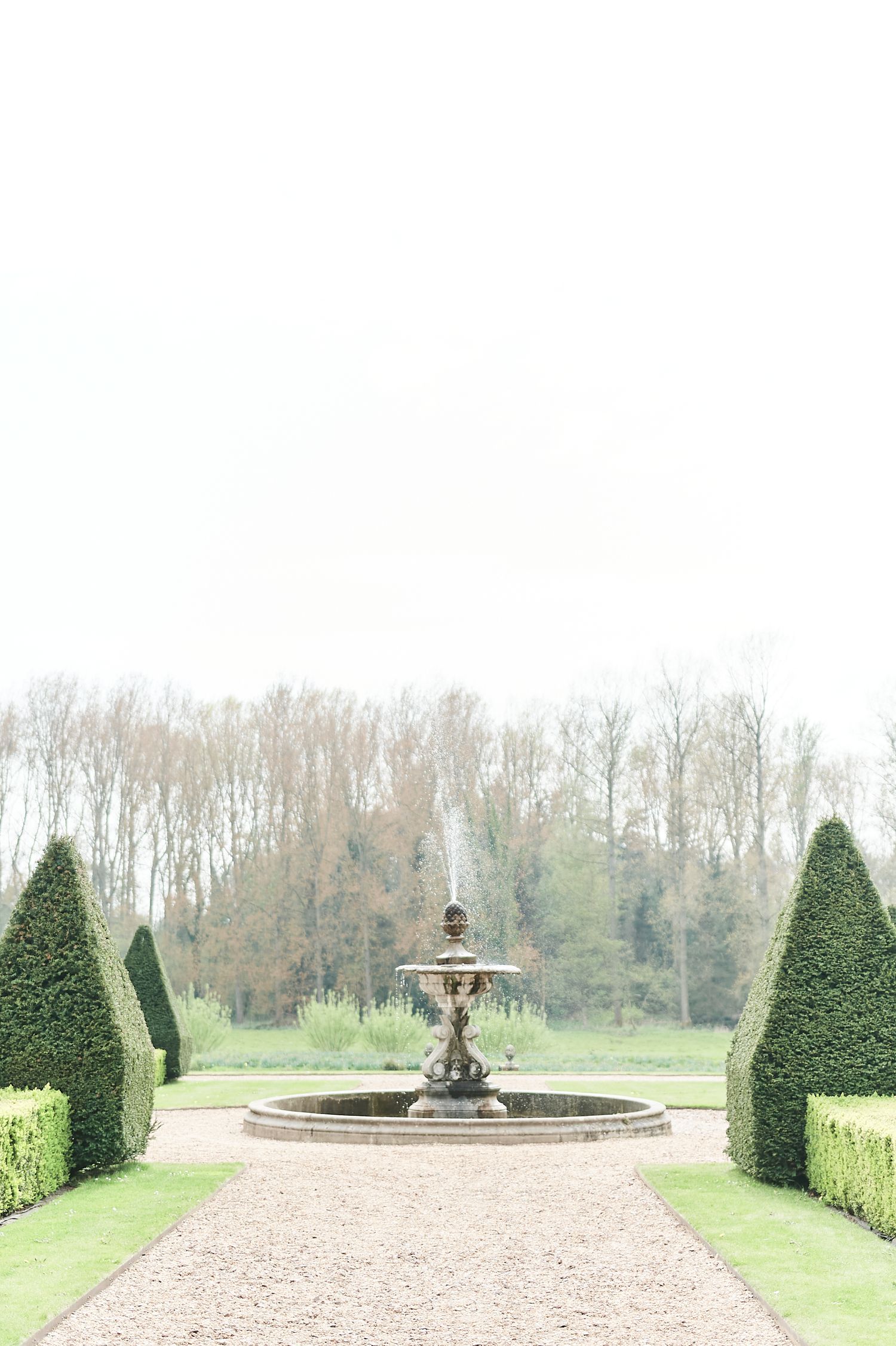 garden water fountain at luxury wedding venue Oxnead Hall, Norwich. by Norwich's best wedding photographer Faye Amare