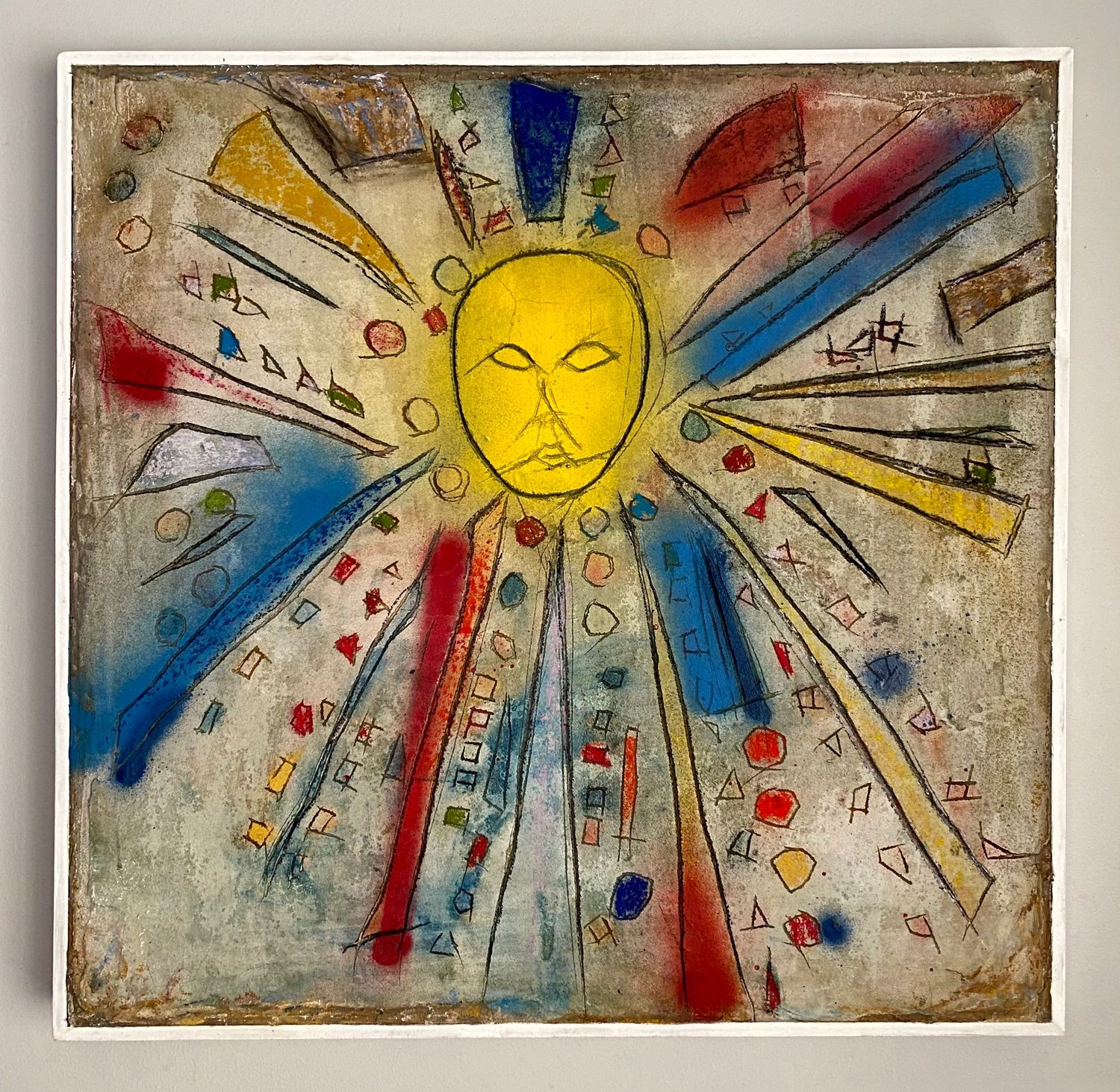 'Solomon' mixed media painting on canvas. Yellow face with primary colour rays and shapes emitting from it.