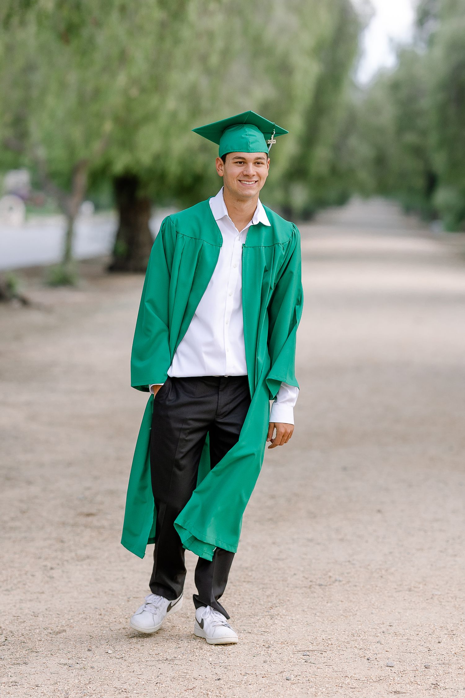 Upland High School Senior Guy Photo Green Graduation cap and Gown