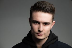 low key acting headshot of young male actor.
