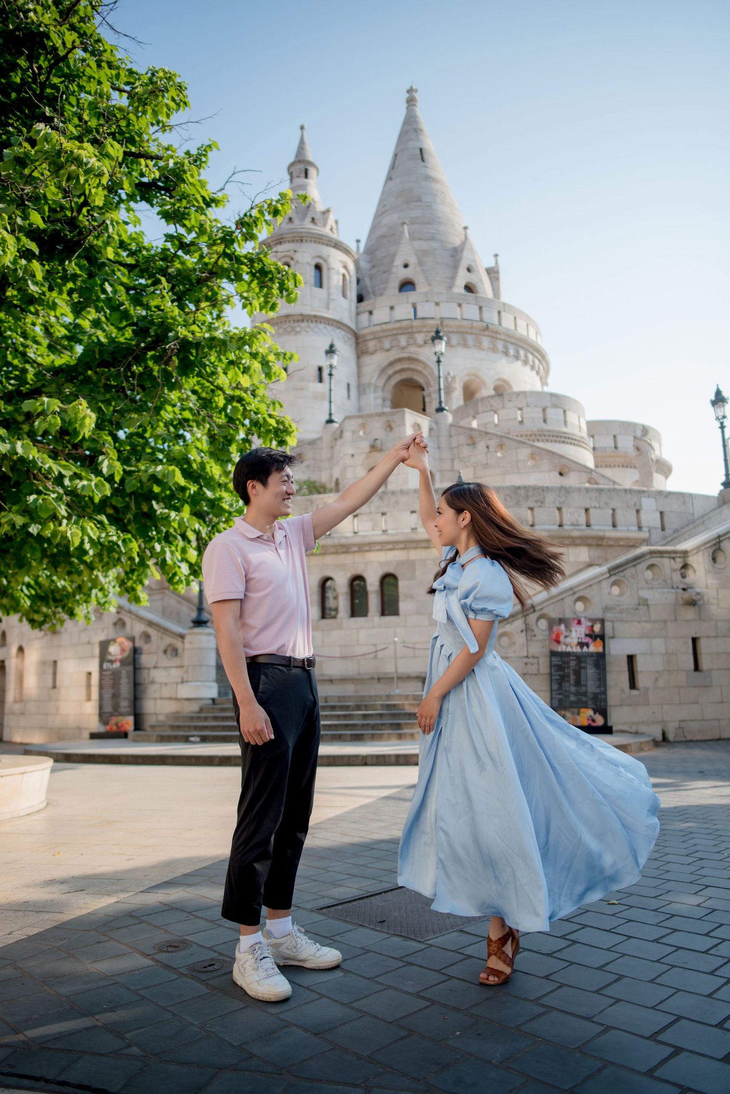couple dancing for a photo shoot in fisherman's bastion