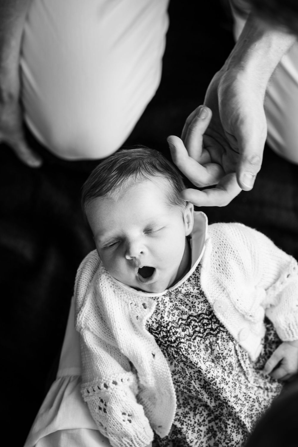 newborn yawns during her portrait session