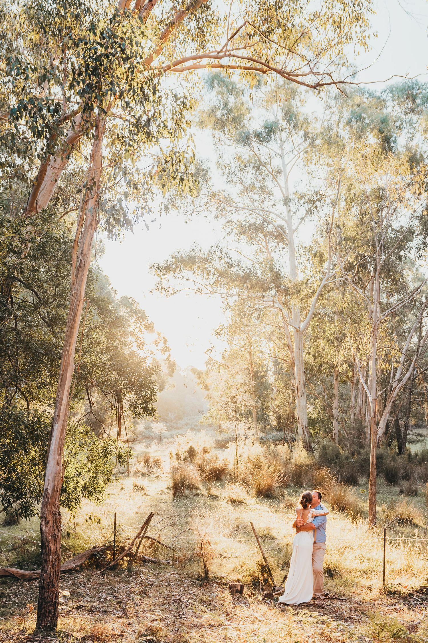 romantic image of bride and groom by tasmanian elopement and wedding photographer joss jensen