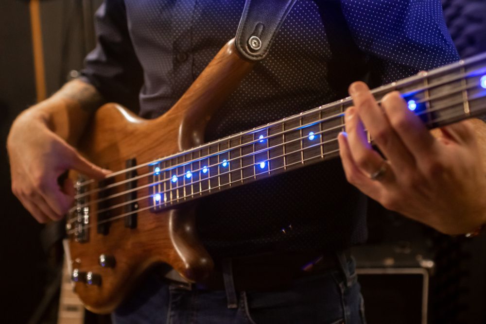 man playing electric guitar