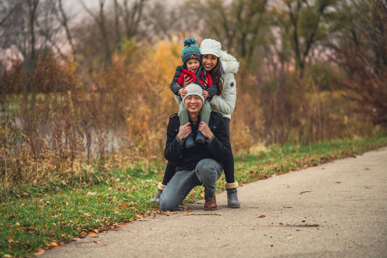 Smiling family fall forest preserve Aurora photo