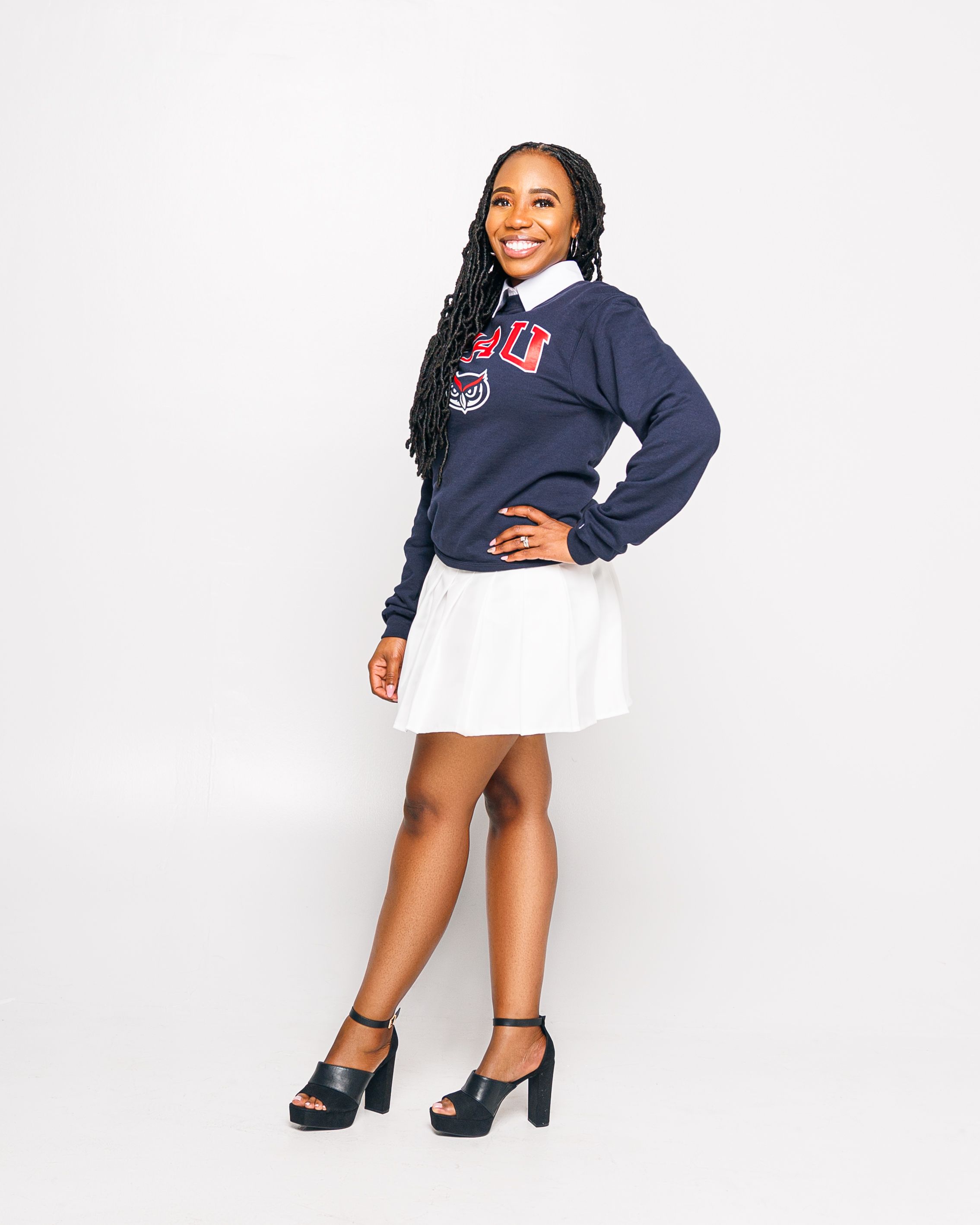 In studio photoshoot for fau masters graduate