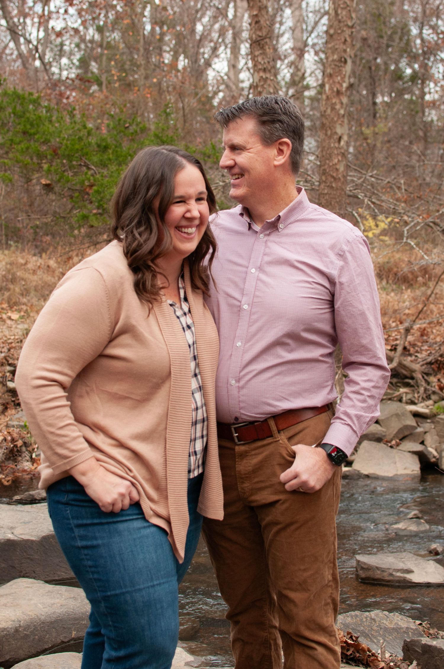 Parents laughing together couple image