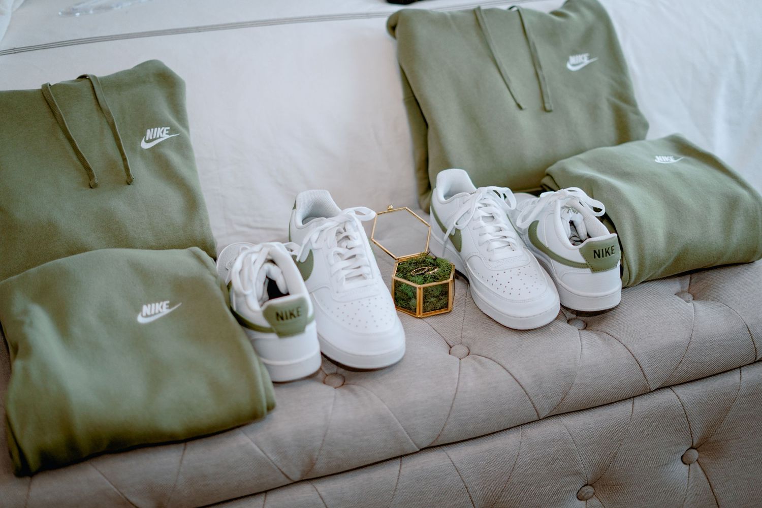 wedding accessories set up on a sofa
